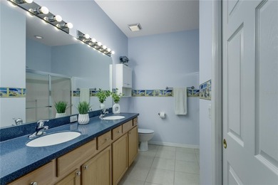 Live your best Florida life in this cheerful and easy-living on The Groves Golf and Country Club in Florida - for sale on GolfHomes.com, golf home, golf lot