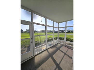 Your canvas awaits! Just needs a little TLC to make it shine on The American Golf Club in Florida - for sale on GolfHomes.com, golf home, golf lot