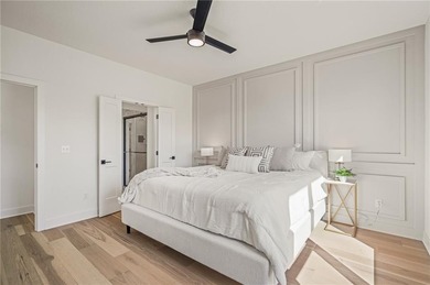 Discover modern, low-maintenance luxury living in this stunning on The Golf Club of Kansas in Kansas - for sale on GolfHomes.com, golf home, golf lot