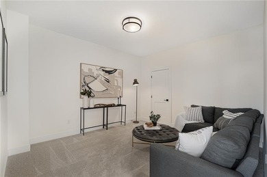 Discover modern, low-maintenance luxury living in this stunning on The Golf Club of Kansas in Kansas - for sale on GolfHomes.com, golf home, golf lot