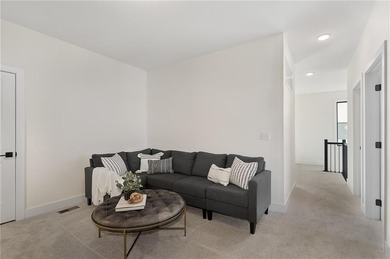 Discover modern, low-maintenance luxury living in this stunning on The Golf Club of Kansas in Kansas - for sale on GolfHomes.com, golf home, golf lot