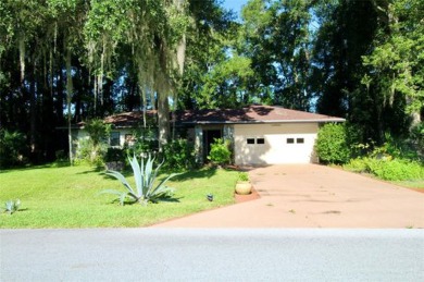 Discover your dream home in the serene Rainbow Springs Country on Rainbow Springs Golf and Country Club in Florida - for sale on GolfHomes.com, golf home, golf lot