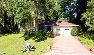 Discover your dream home in the serene Rainbow Springs Country on Rainbow Springs Golf and Country Club in Florida - for sale on GolfHomes.com, golf home, golf lot