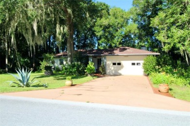 Discover your dream home in the serene Rainbow Springs Country on Rainbow Springs Golf and Country Club in Florida - for sale on GolfHomes.com, golf home, golf lot