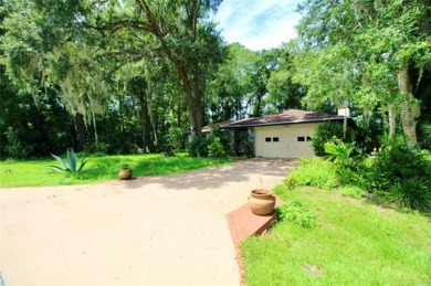 Discover your dream home in the serene Rainbow Springs Country on Rainbow Springs Golf and Country Club in Florida - for sale on GolfHomes.com, golf home, golf lot