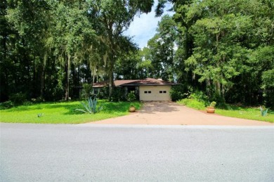 Discover your dream home in the serene Rainbow Springs Country on Rainbow Springs Golf and Country Club in Florida - for sale on GolfHomes.com, golf home, golf lot