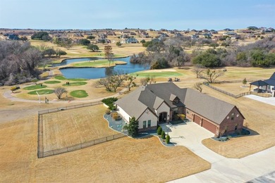 Set on the signature hole in Canyon West's Golf Course on 1 on Canyon West Golf Club in Texas - for sale on GolfHomes.com, golf home, golf lot