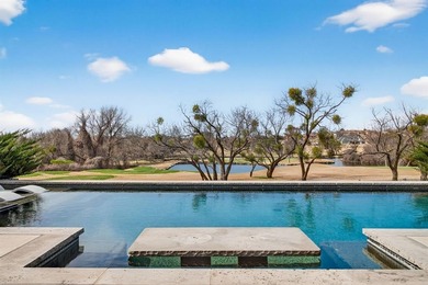 Set on the signature hole in Canyon West's Golf Course on 1 on Canyon West Golf Club in Texas - for sale on GolfHomes.com, golf home, golf lot