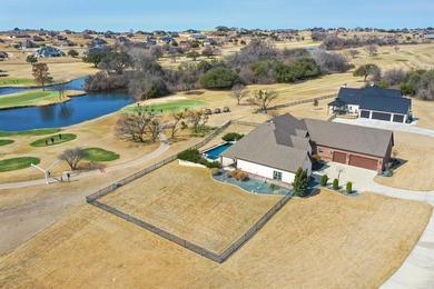 Set on the signature hole in Canyon West's Golf Course on 1 on Canyon West Golf Club in Texas - for sale on GolfHomes.com, golf home, golf lot