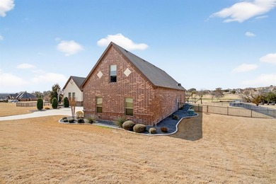 Set on the signature hole in Canyon West's Golf Course on 1 on Canyon West Golf Club in Texas - for sale on GolfHomes.com, golf home, golf lot