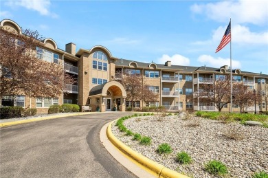 Welcome to this sun-drenched corner unit overlooking the serene on Edinburgh USA in Minnesota - for sale on GolfHomes.com, golf home, golf lot