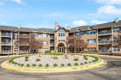 Welcome to this sun-drenched corner unit overlooking the serene on Edinburgh USA in Minnesota - for sale on GolfHomes.com, golf home, golf lot