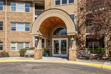 Welcome to this sun-drenched corner unit overlooking the serene on Edinburgh USA in Minnesota - for sale on GolfHomes.com, golf home, golf lot