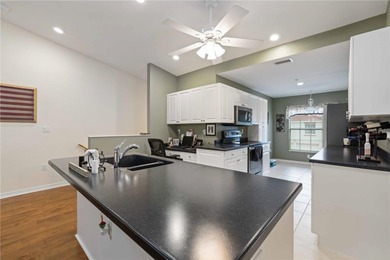 Set within the Tara Preserve community, this bright and open on The Preserve Golf Club At Tara in Florida - for sale on GolfHomes.com, golf home, golf lot