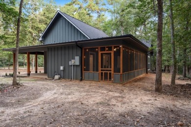 Discover modern living with a rustic touch at Holly Lake Ranch on Holly Lake Ranch Golf Club in Texas - for sale on GolfHomes.com, golf home, golf lot