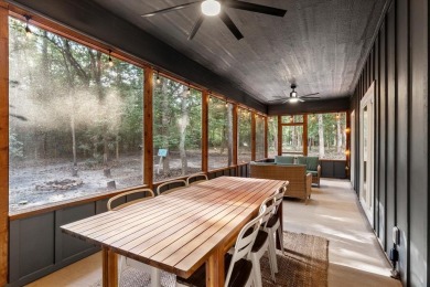 Discover modern living with a rustic touch at Holly Lake Ranch on Holly Lake Ranch Golf Club in Texas - for sale on GolfHomes.com, golf home, golf lot