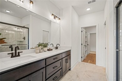 Discover modern, low-maintenance luxury living in this stunning on The Golf Club of Kansas in Kansas - for sale on GolfHomes.com, golf home, golf lot