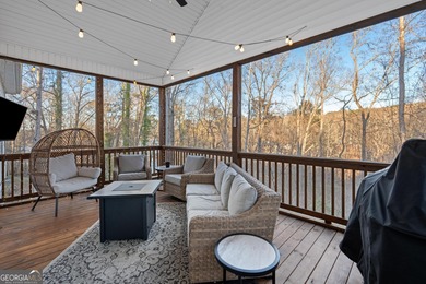 Tucked away just steps from Jackson Lake, this beautifully on Turtle Cove Golf Course in Georgia - for sale on GolfHomes.com, golf home, golf lot