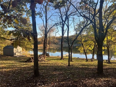 Modern Lakefront Retreat -- Built in 2023, this thoughtfully on Sugar Valley Lakes Golf Course in Kansas - for sale on GolfHomes.com, golf home, golf lot