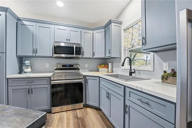 Price Improvement! Discover quiet lakefront living in this on Sugar Valley Lakes Golf Course in Kansas - for sale on GolfHomes.com, golf home, golf lot