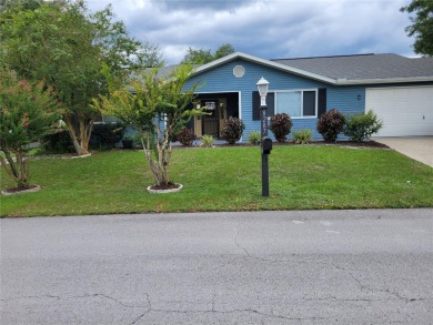 Beautiful 3 bedroom, 2 bath home in the gated 55+ oak run on Royal Oaks Golf Club in Florida - for sale on GolfHomes.com, golf home, golf lot