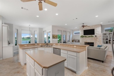This custom home in the sought-after Village of Ballantrae on Stonebridge Ranch Country Club - Dye in Texas - for sale on GolfHomes.com, golf home, golf lot