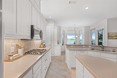This custom home in the sought-after Village of Ballantrae on Stonebridge Ranch Country Club - Dye in Texas - for sale on GolfHomes.com, golf home, golf lot