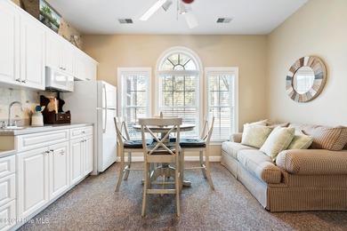 Welcome to this beautifully furnished first-floor, 2-bedroom on Sea Trail Golf Resort in North Carolina - for sale on GolfHomes.com, golf home, golf lot