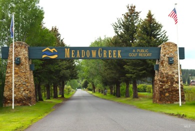 Discover serene living on this stunning, level lot nestled along on Meadowcreek Golf Resort in Idaho - for sale on GolfHomes.com, golf home, golf lot