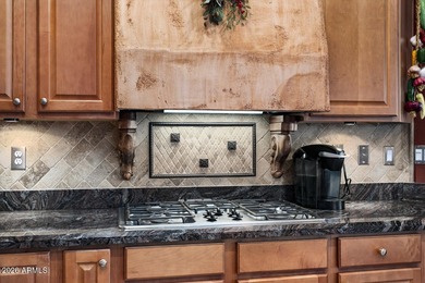 Welcome to this beautiful Cambridge model perfectly situated on on Cimarron Golf Club in Arizona - for sale on GolfHomes.com, golf home, golf lot