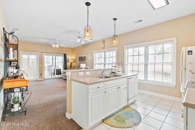 Welcome to this beautifully furnished first-floor, 2-bedroom on Sea Trail Golf Resort in North Carolina - for sale on GolfHomes.com, golf home, golf lot