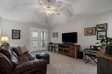 This custom home in the sought-after Village of Ballantrae on Stonebridge Ranch Country Club - Dye in Texas - for sale on GolfHomes.com, golf home, golf lot