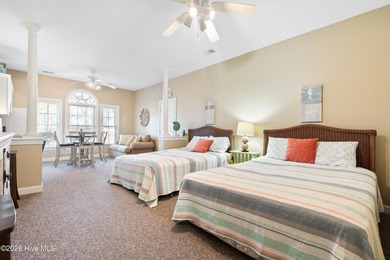 Welcome to this beautifully furnished first-floor, 2-bedroom on Sea Trail Golf Resort in North Carolina - for sale on GolfHomes.com, golf home, golf lot