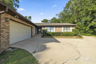 Welcome to this inviting 3-bedroom, 2.5-bath home on the golf on Lake Forest Yacht and Country Club in Alabama - for sale on GolfHomes.com, golf home, golf lot