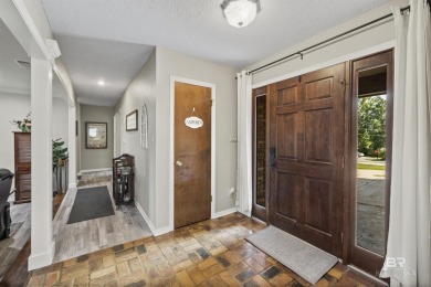 Welcome to this inviting 3-bedroom, 2.5-bath home on the golf on Lake Forest Yacht and Country Club in Alabama - for sale on GolfHomes.com, golf home, golf lot