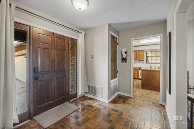 Welcome to this inviting 3-bedroom, 2.5-bath home on the golf on Lake Forest Yacht and Country Club in Alabama - for sale on GolfHomes.com, golf home, golf lot