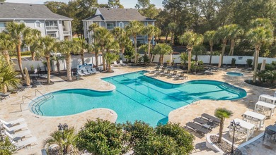 Welcome to this beautifully furnished first-floor, 2-bedroom on Sea Trail Golf Resort in North Carolina - for sale on GolfHomes.com, golf home, golf lot