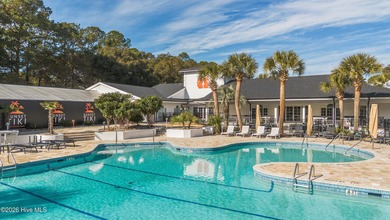 Welcome to this beautifully furnished first-floor, 2-bedroom on Sea Trail Golf Resort in North Carolina - for sale on GolfHomes.com, golf home, golf lot