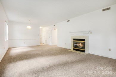 Rare opportunity to own an end unit ground level condo in a on Asheville Municipal Golf Course in North Carolina - for sale on GolfHomes.com, golf home, golf lot