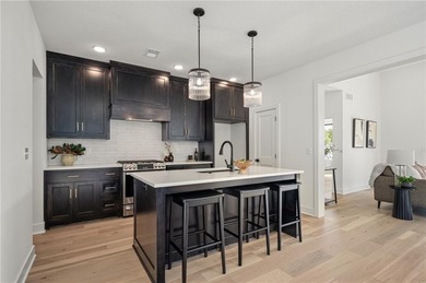 Discover modern, low-maintenance living in this stunning 1 on The Golf Club of Kansas in Kansas - for sale on GolfHomes.com, golf home, golf lot