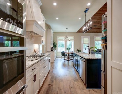 Welcome to your dream home in an exclusive gated subdivision on Hot Springs Golf and Country Club in Arkansas - for sale on GolfHomes.com, golf home, golf lot