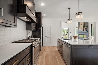 Discover modern, low-maintenance living in this stunning 1 on The Golf Club of Kansas in Kansas - for sale on GolfHomes.com, golf home, golf lot