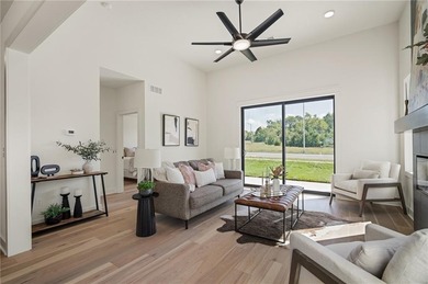 Discover modern, low-maintenance living in this stunning 1 on The Golf Club of Kansas in Kansas - for sale on GolfHomes.com, golf home, golf lot