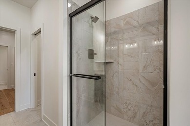 Discover modern, low-maintenance living in this stunning 1 on The Golf Club of Kansas in Kansas - for sale on GolfHomes.com, golf home, golf lot