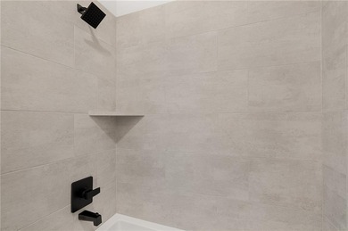 Discover modern, low-maintenance living in this stunning 1 on The Golf Club of Kansas in Kansas - for sale on GolfHomes.com, golf home, golf lot