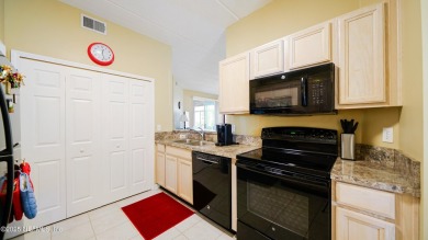 Welcome to effortless Florida living in this ground-floor end on St. Augustine Shores Golf Club in Florida - for sale on GolfHomes.com, golf home, golf lot