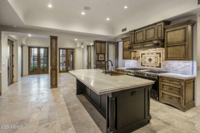 Set on an expansive acre-plus lot within Hidden Paradise--a on Camelback Golf Club in Arizona - for sale on GolfHomes.com, golf home, golf lot
