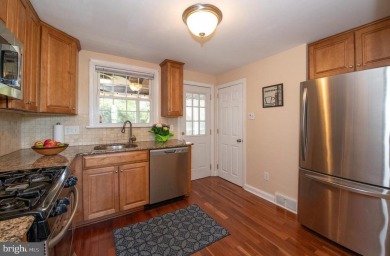 Situated in the heart of Lafayette Hill with sweeping views of on Green Valley Country Club in Pennsylvania - for sale on GolfHomes.com, golf home, golf lot