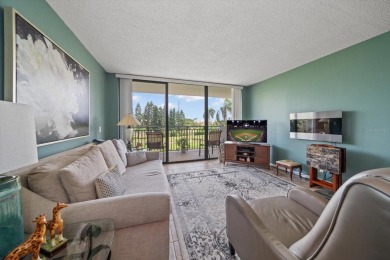Under contract-accepting backup offers. Experience tranquility on Isla Del Sol Yacht and Country Club in Florida - for sale on GolfHomes.com, golf home, golf lot