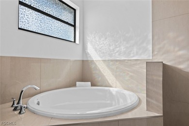 From the moment you arrive, this 3 bedroom, 2 bathroom pool home on Burnt Store Golf Club in Florida - for sale on GolfHomes.com, golf home, golf lot